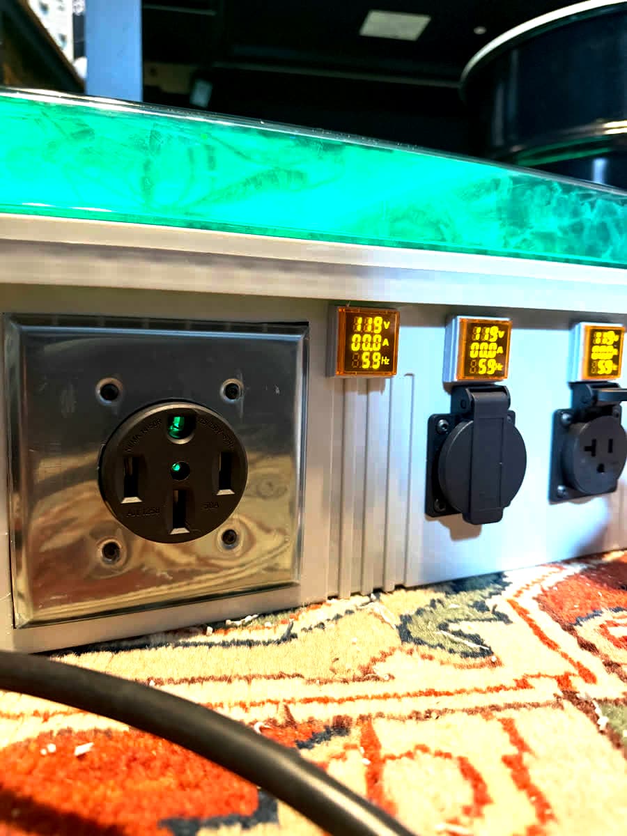 Power outlet ports on the enclosure